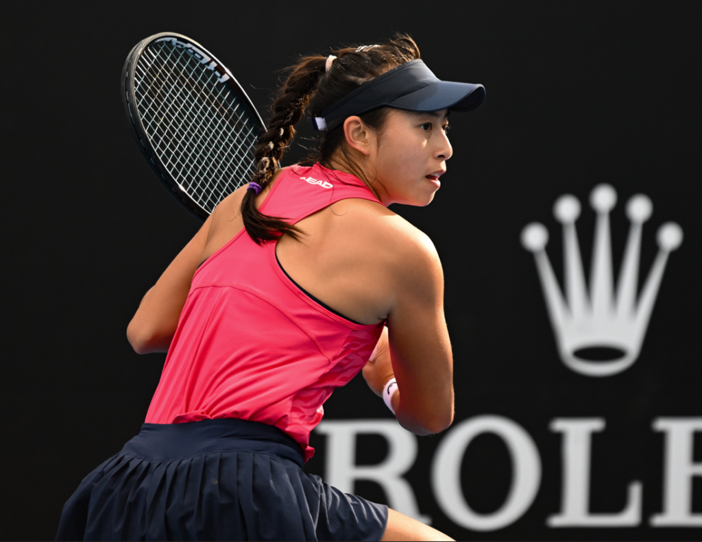 Carol Zhao winds up to hit a backhand.