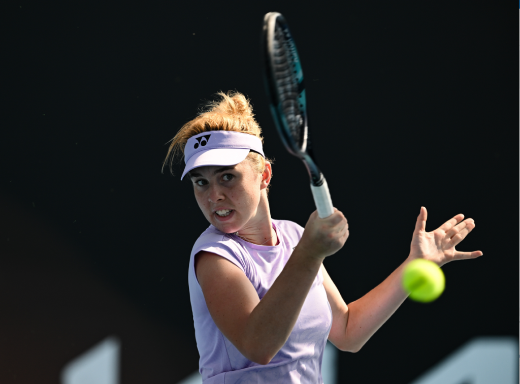 Linda Noskova follows through on a forehand.