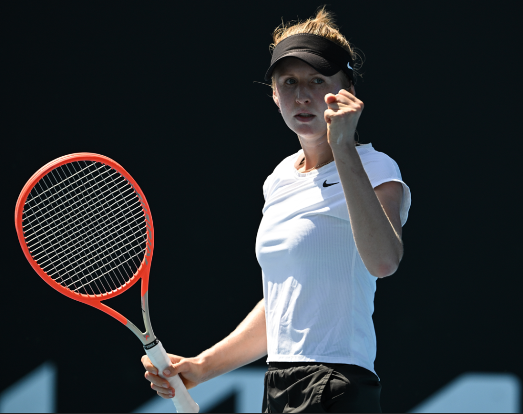 Katherine Sebov pumps her fist.