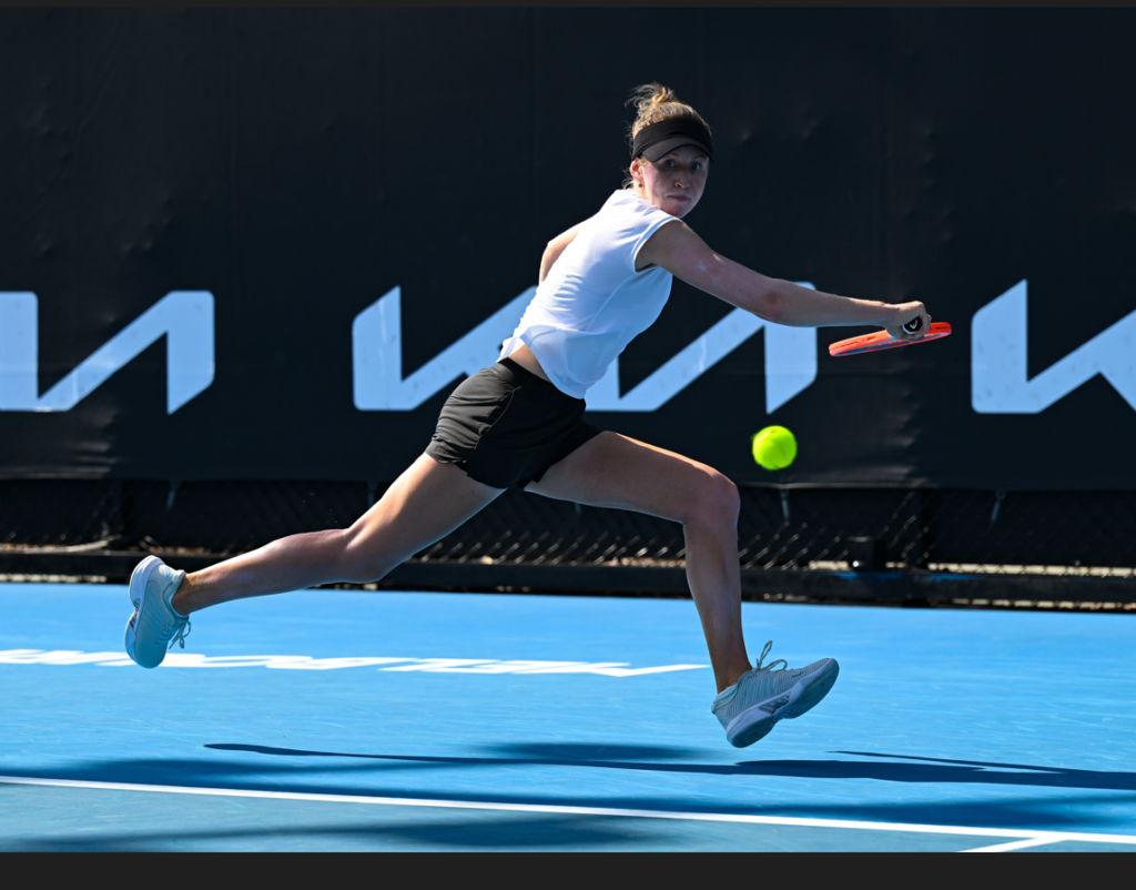 Katherine Sebov runs and gets ready to hit a backhand.