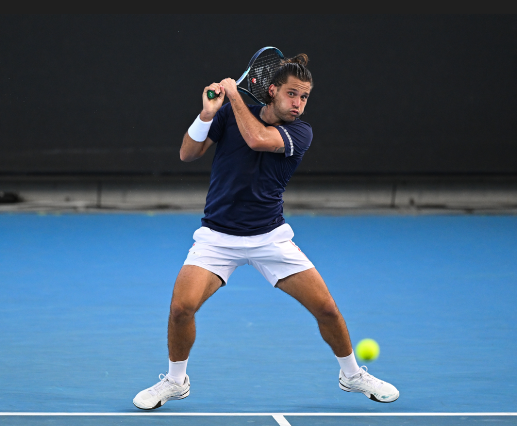 Alexis Galarneau follows through on a backhand.