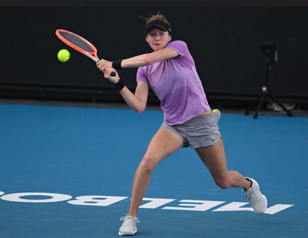 Katherine Sebov follows through on a backhand.