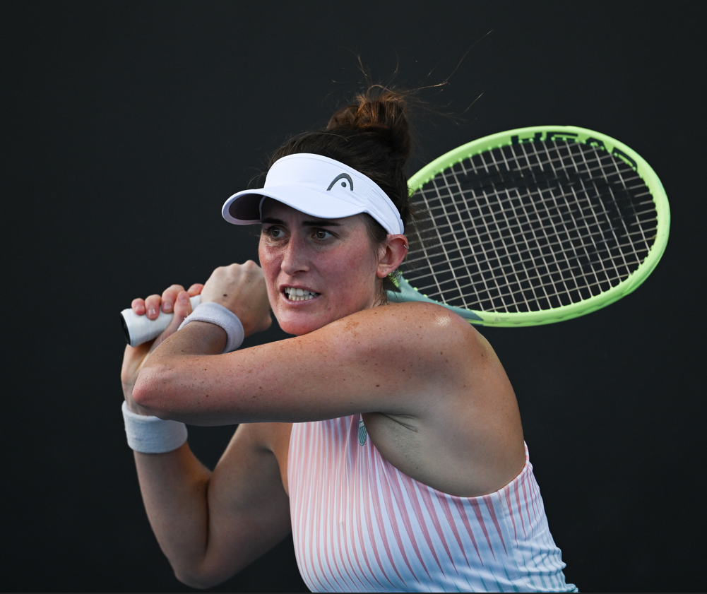 Rebecca Marino follows through on a backhand.