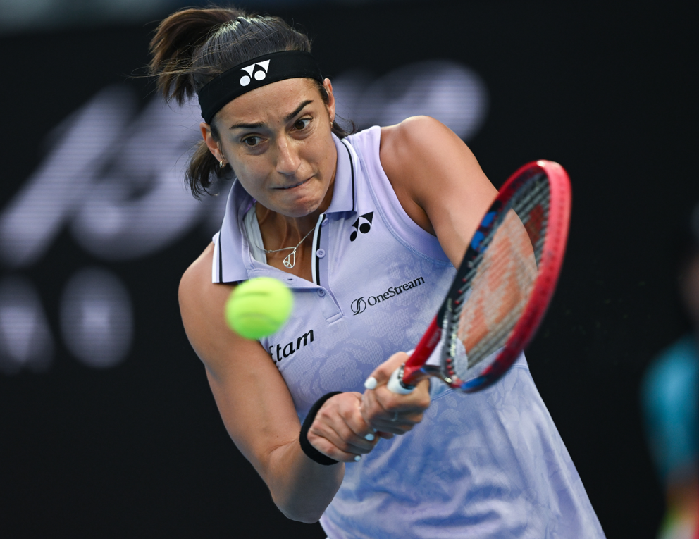 Caroline Garcia hits a backhand.