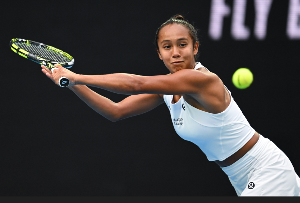 Leylah Fernandez reaches out to hit a backhand.